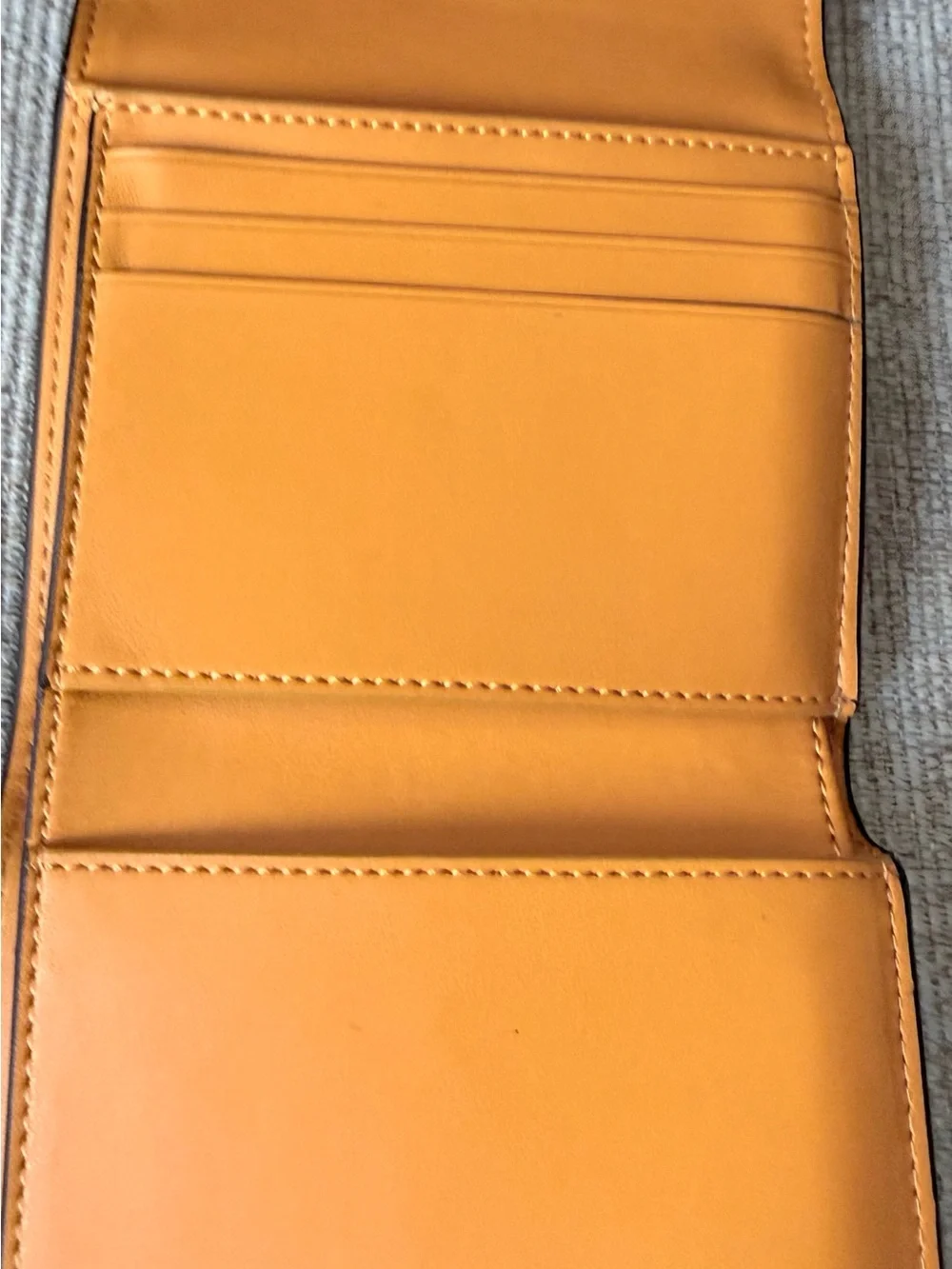 Coach Orange Leather Compact Wallet with Gold 'C' Hardware